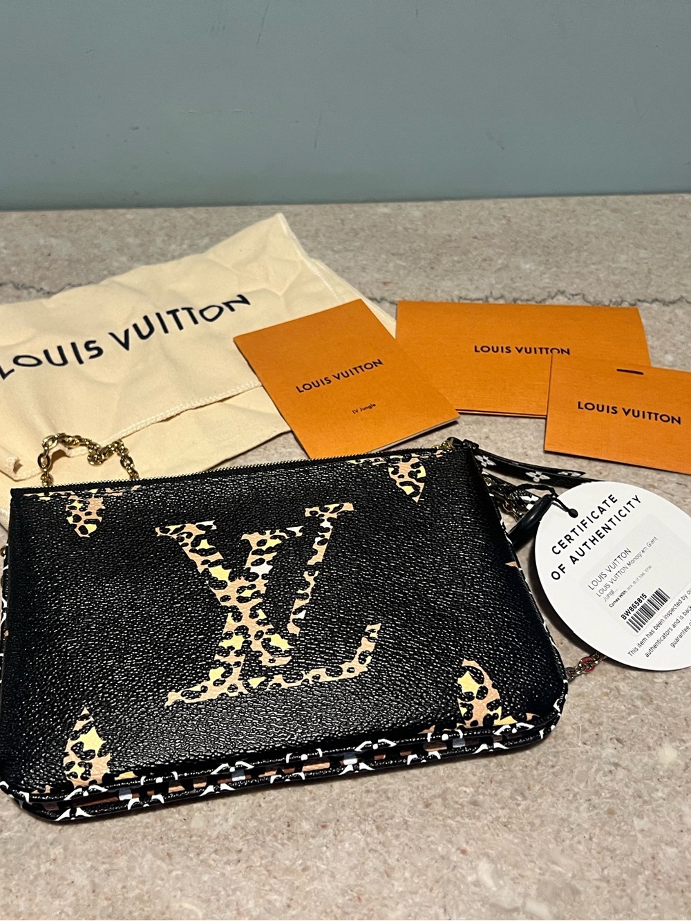LOUIS VUITTON
Double Zip Jungle Pochette Giant Monogram Leather Crossbody Bag - Picture 9 of 15